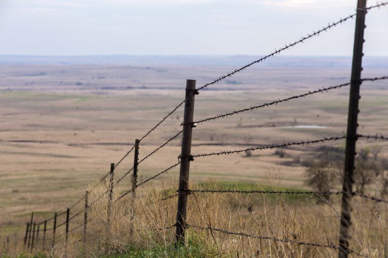 Farm Fence with Barbed Wire